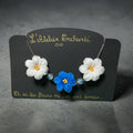Collier 3 fleurs blanc et bleu chaîne argent